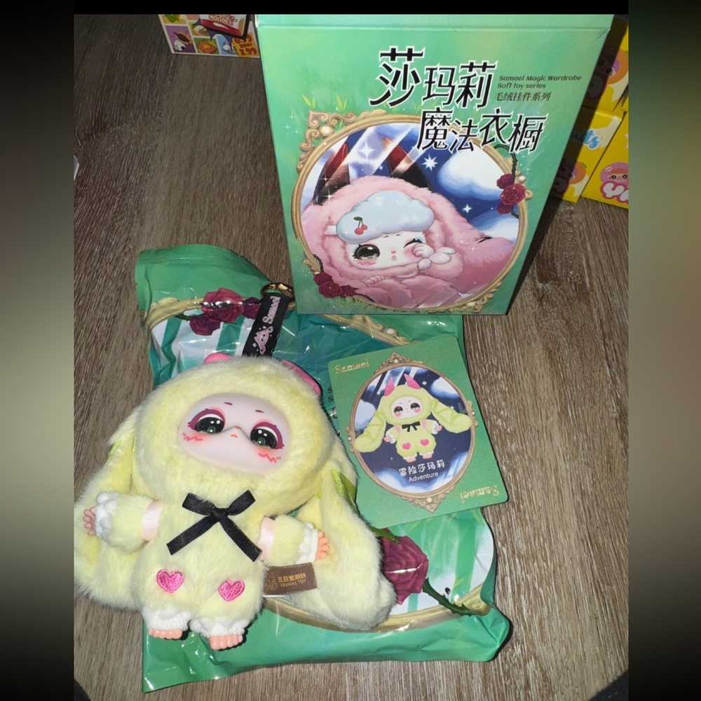 Cute Yellow Plush Toy with Green Packaging
